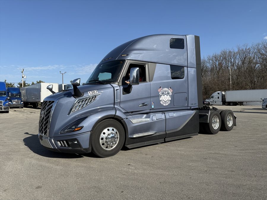 Delta Carrier Group slate blue-gray Volvo VNL 860 unit 1307 yard