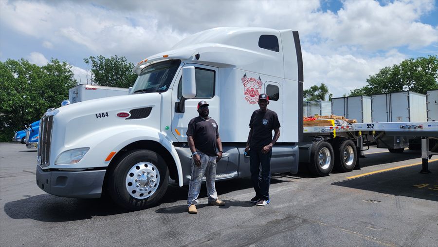 Delta Carrier Group white Peterbilt 579 unit 1464 yard